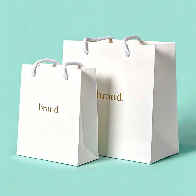 Frequent Handle Tearing of Beauty Paper Bags During Shipment? Triple Reinforcement Craft Solves All Loss Issues for Custom Export Fragrance Handbags Resistant to Tearing